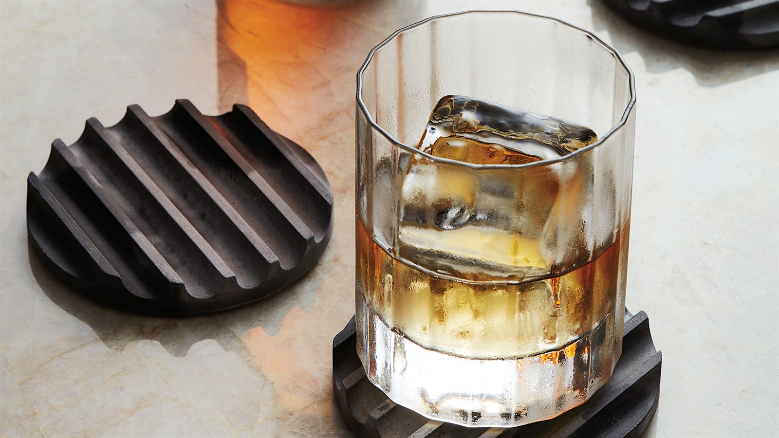 RBT’s Flask-Style Decanter next to a glass of red wine